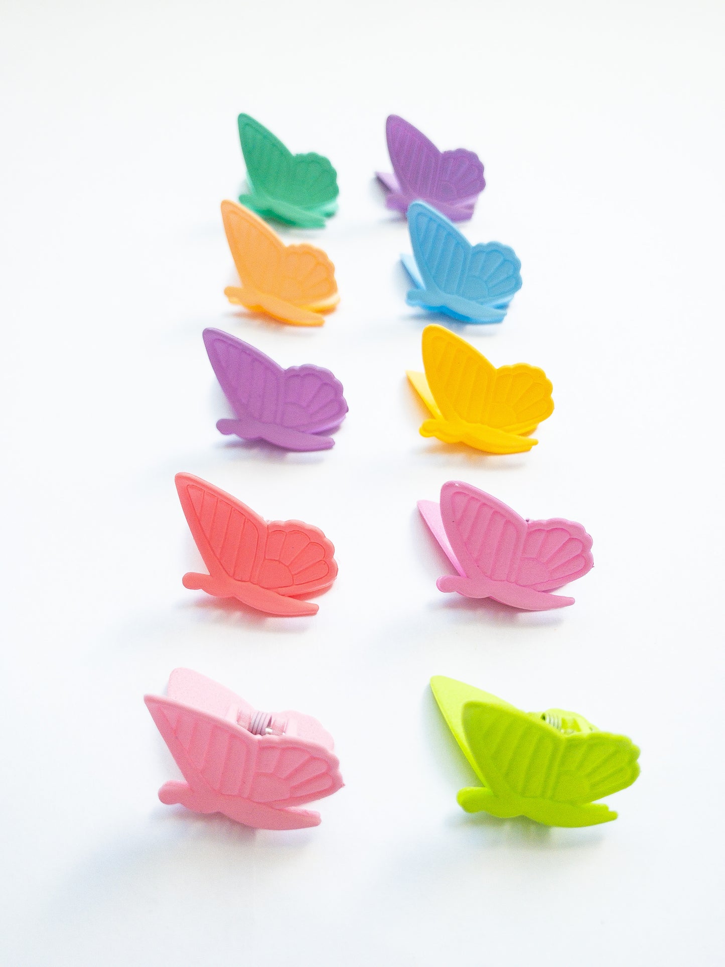 90s revival! Those butterfly claw clips you remember so well in yummy candy colors. This set comes with 10 pieces in a fun color mix of fluttering butterfli90s revival! Those butterfly claw clips you remember so well in yummy candy colors. This set comes with 10 pieces in a fun color mix of fluttering butterflies.