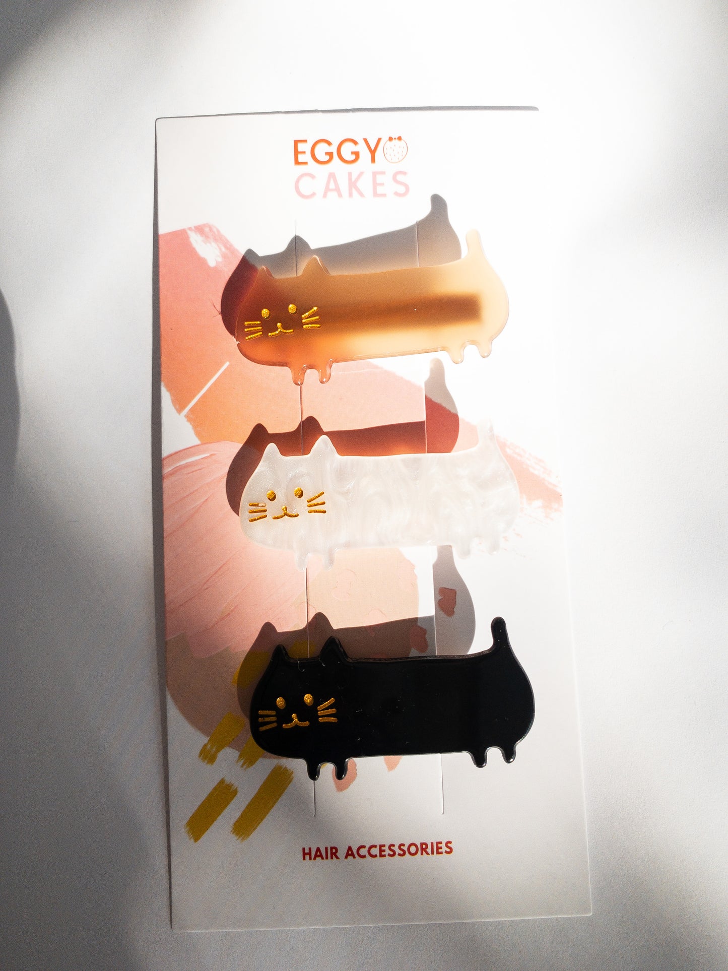 Do not fear, the meow crew is here! Long, slinky, happy cat hair clips in light brown, midnight black and shimmery, swirly white.