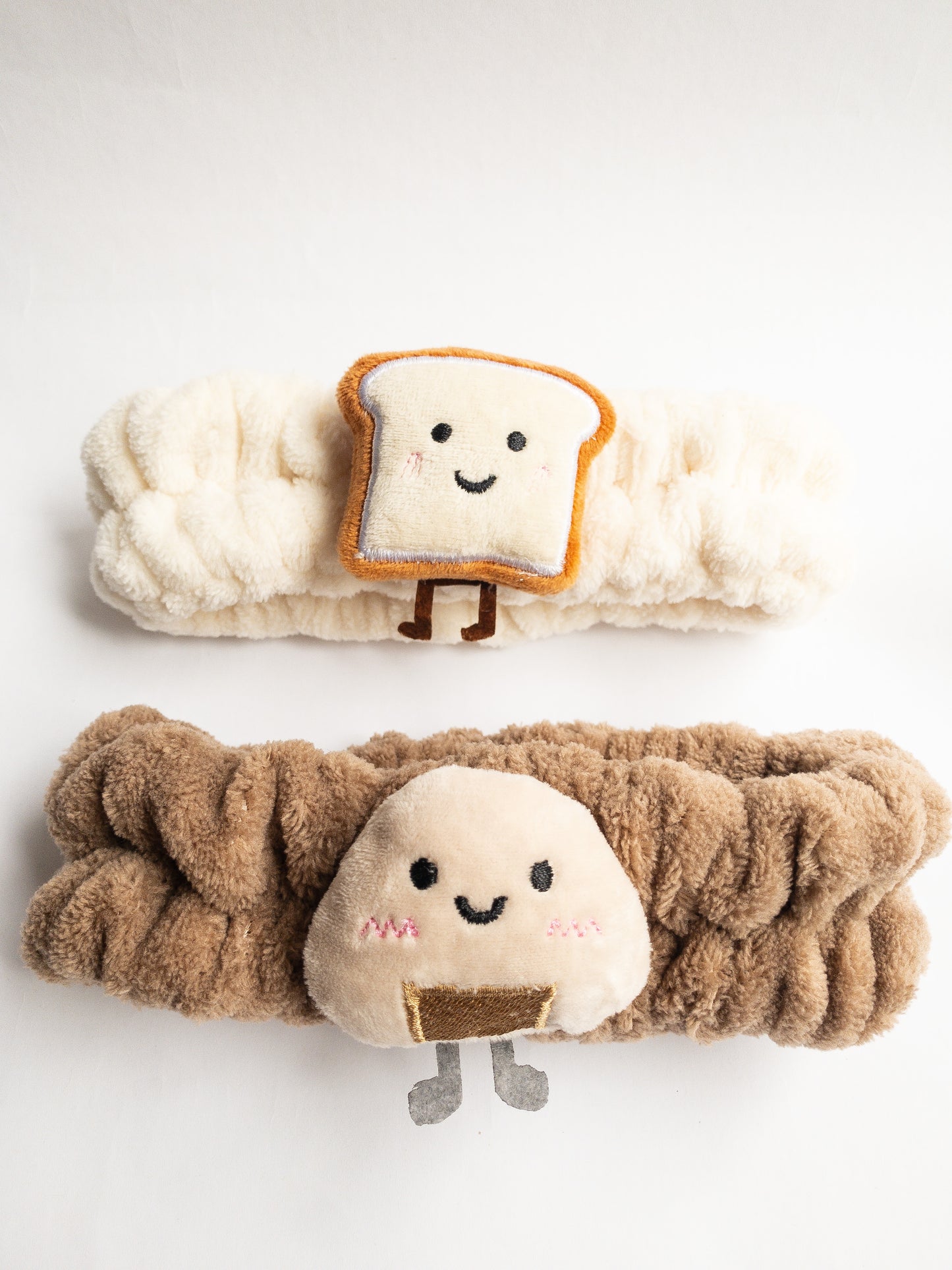 Our adorable onigiri plush spa headband makes the perfect accessory for all your spa days! Each headband is so soft and comfy with a cute rice ball (ju-mok bap in Korean). Pamper yourself in plushy-goodness and sweet, sweet relaxation! Go ahead, you deserve it!