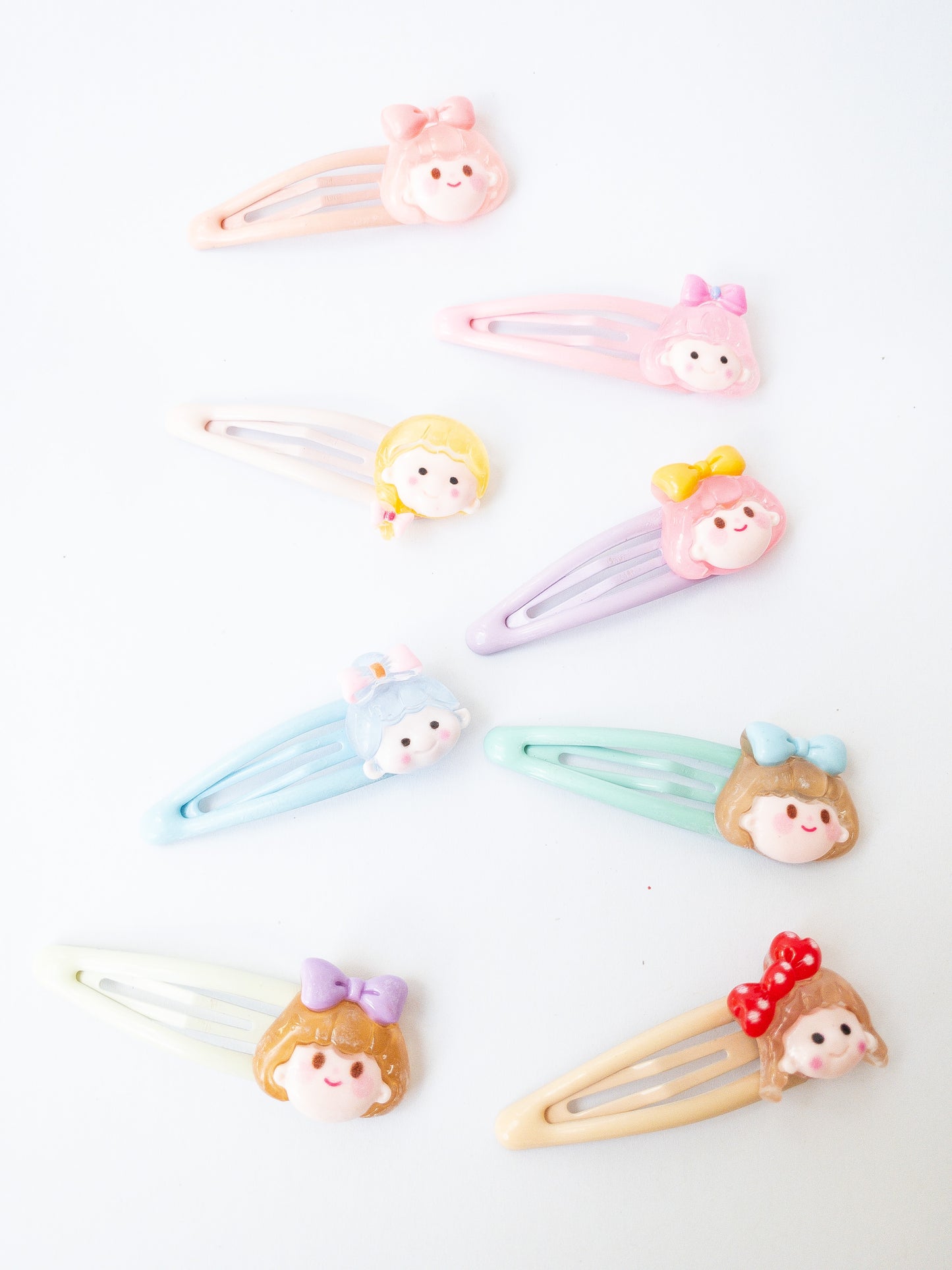 A sweet and mighty set of cartoon girl characters on glossy, pastel snap clips! Each set has 8 girl charms with a cute b
