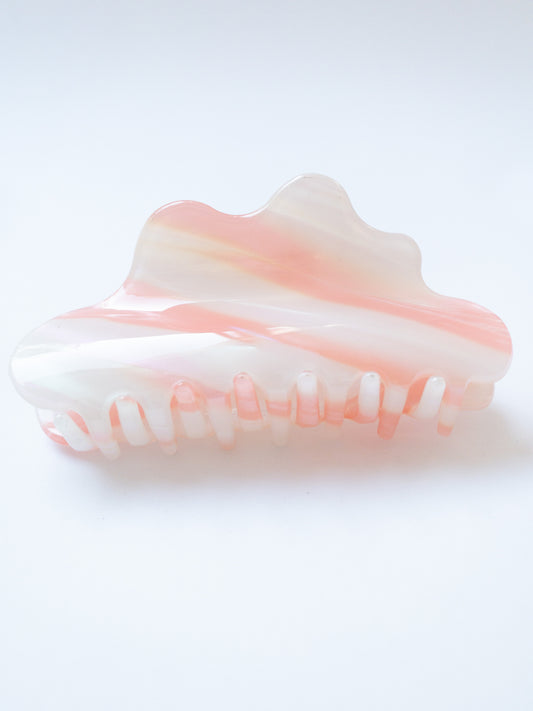 A gorgeous resin acetate cloud shaped hair claw. Each hair claw has unique, beautiful flecks, shimmer and peach pink color. What prettier way to clip back your hair than this dreamy cloud hair claw clip. 