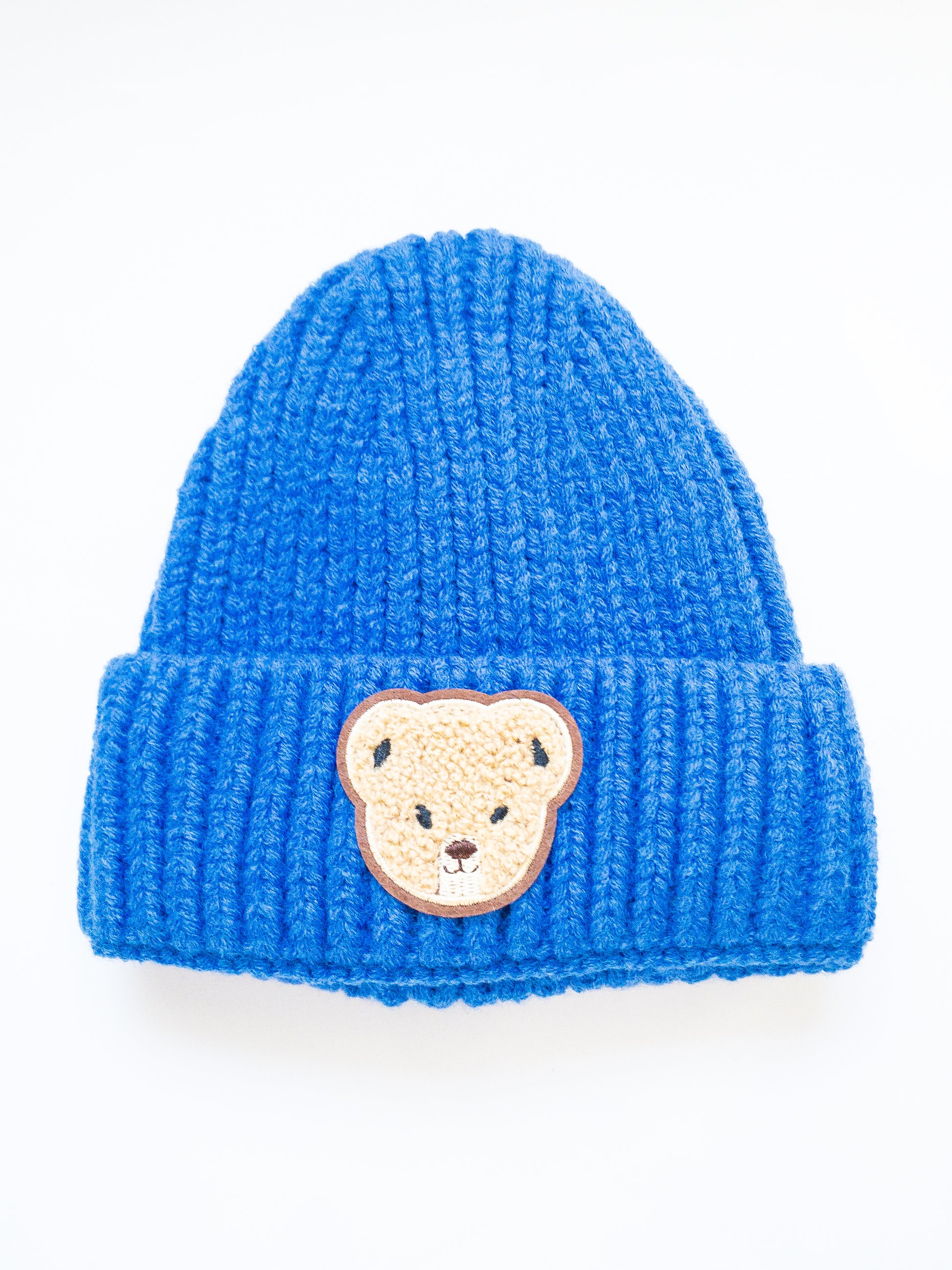 Luxuriously soft, stretchy and thick kids beanie with a cute sherpa bear cub patch. This beanie is already so soft but add in the lining on the inside and it'll keep your child warm and comfortable.
