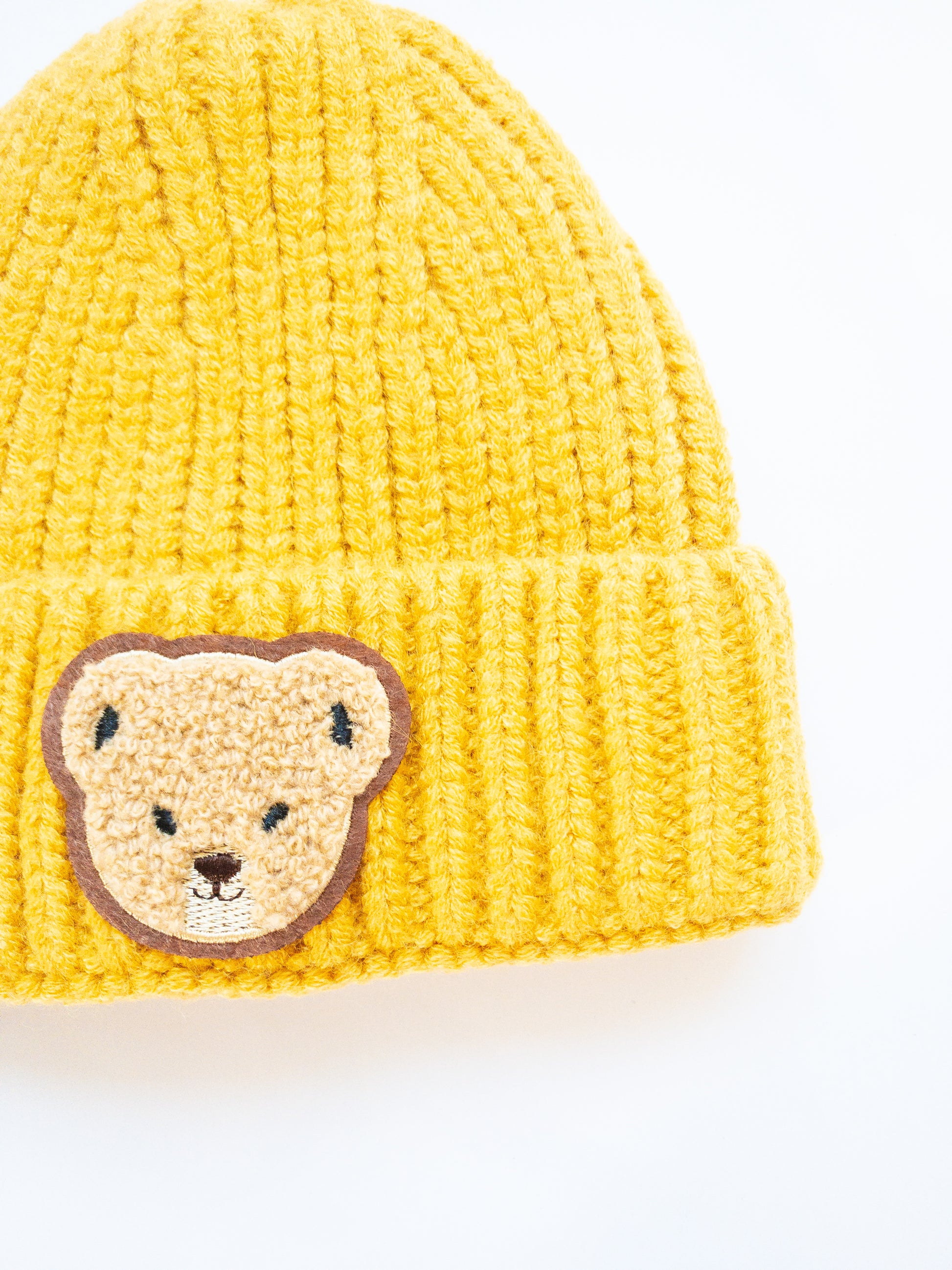 Luxuriously soft, stretchy and thick kids beanie with a cute sherpa bear cub patch. This beanie is already so soft but add in the lining on the inside and it'll keep your child warm and comfortable.