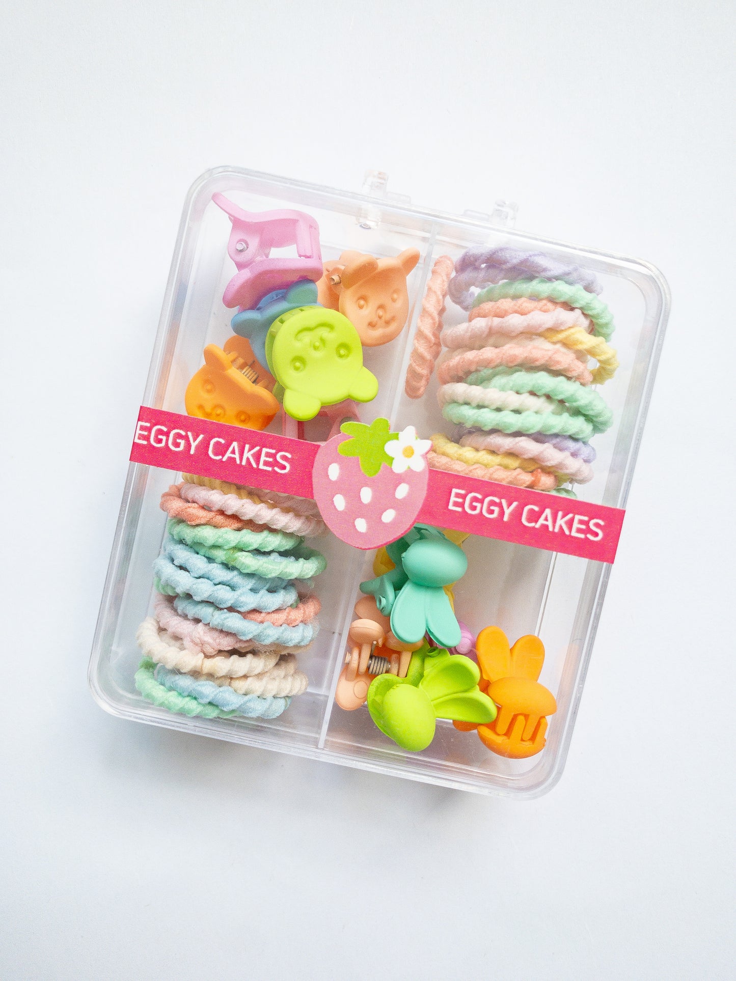 This mini hair claw set is the one you need! A boxed set with a mix of mini bunny hair claws and a mix of mini bear hair claws along with small hair ties. The hair ties are super soft, no tug and thin, perfect for those cute pigtails or braids. Clip the hair claws throughout to make that fun style.