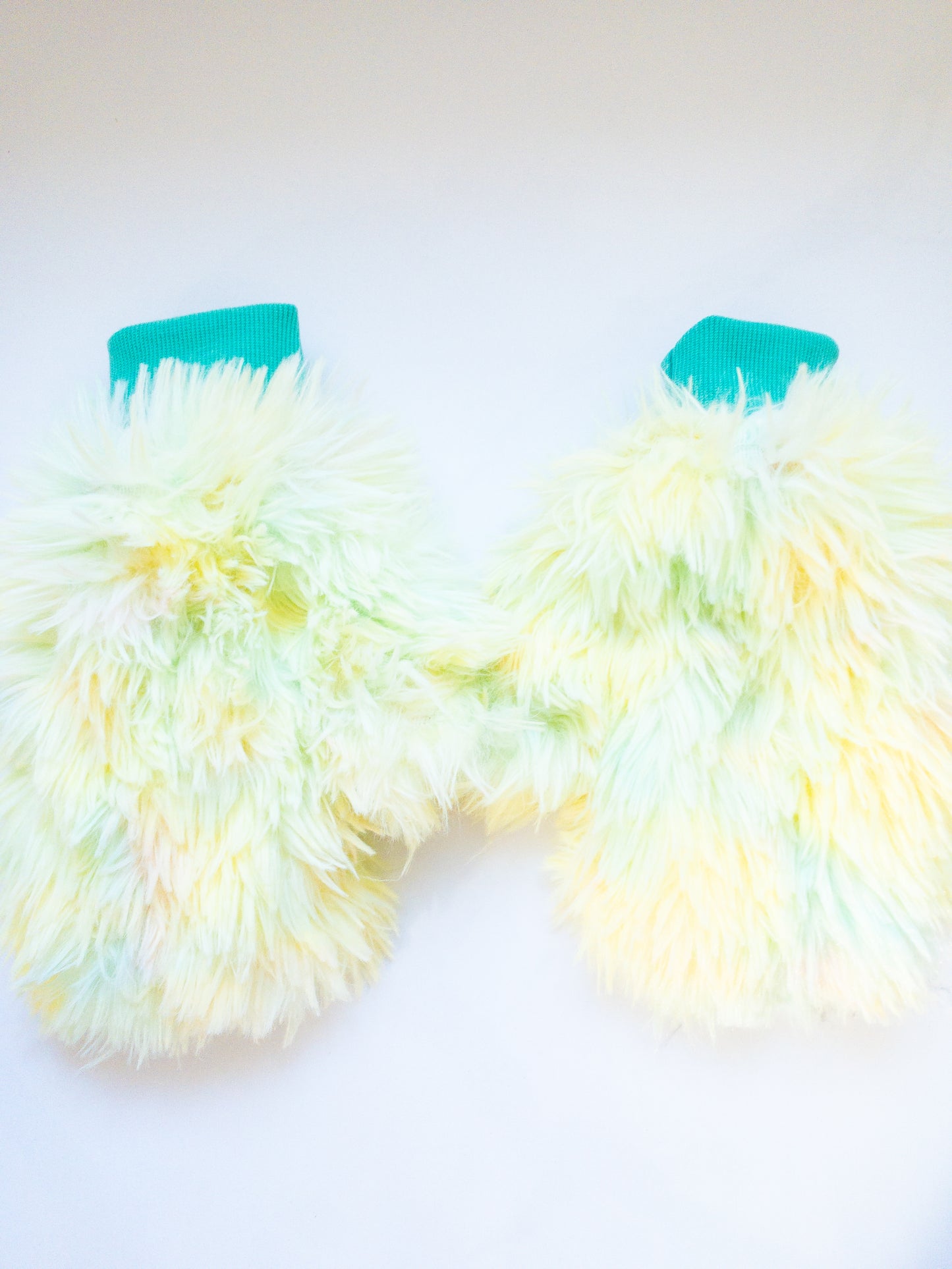 Can you find any more playful mittens than these? Luxuriously soft and ombre furry mittens in a cute monster girl design. The inside is just as soft as the outside. She even has braids with Eggy Cakes mini clips! 