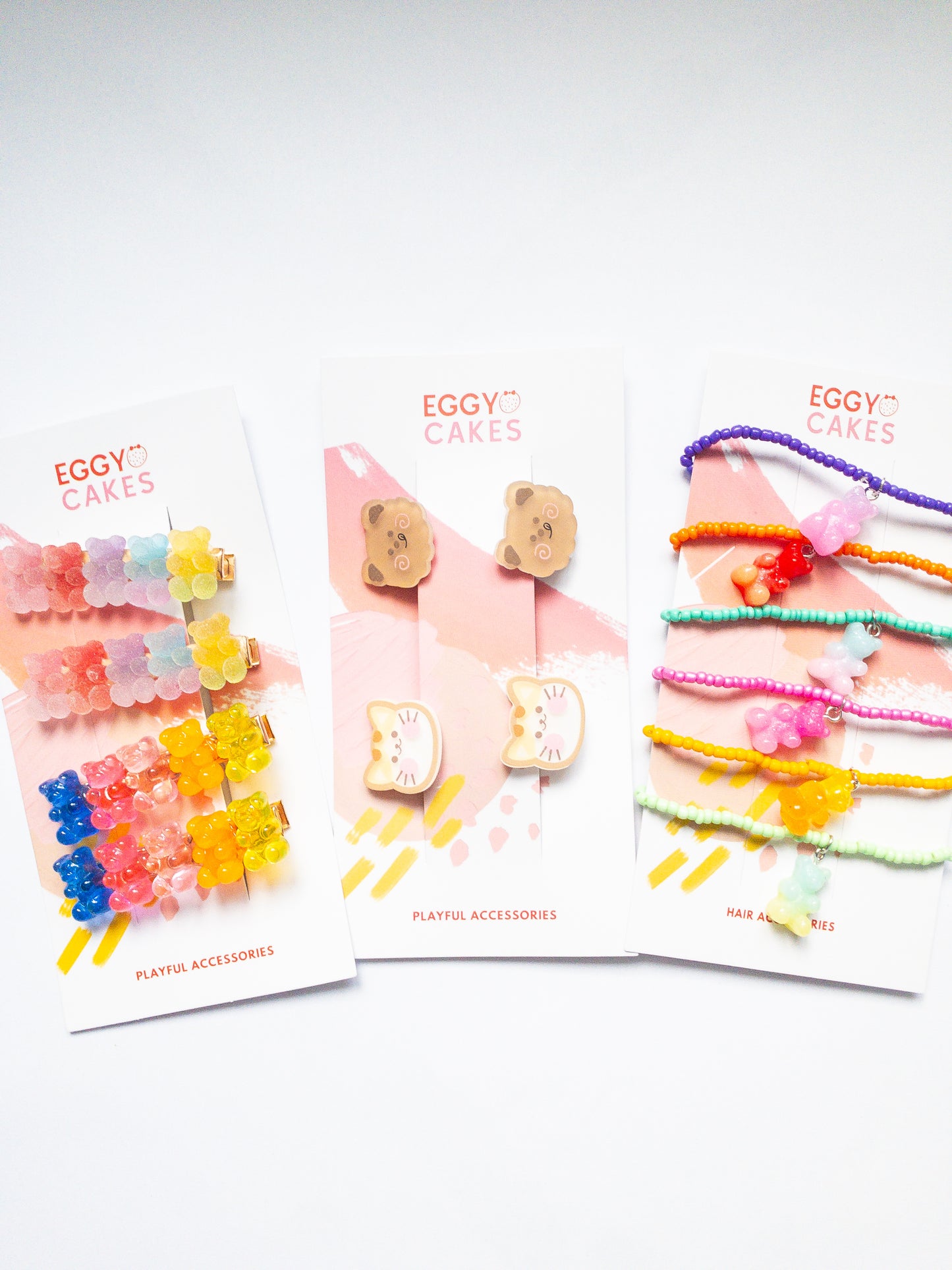 Save $6 with this bundle! You get all the bears--Gummy Bear Hair Clips, Ombre Gummy Bear Bracelet Set (comes with 6 bracelets), and the Catty Bear Hair Ties.