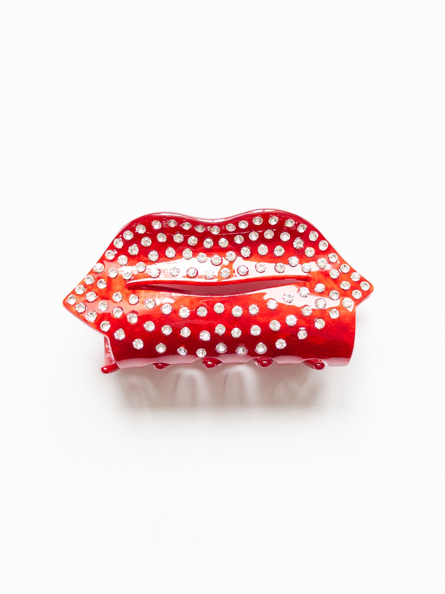 Sweet and sassy kiss lips hair claw clip in a stunning, rich red and adorned with sparkly stones! The perfect size claw clip for half up hairstyles.