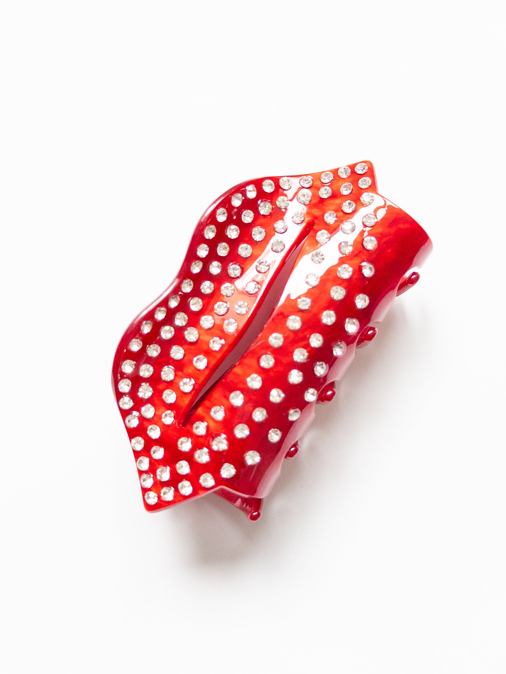 Sweet and sassy kiss lips hair claw clip in a stunning, rich red and adorned with sparkly stones! The perfect size claw clip for half up hairstyles.