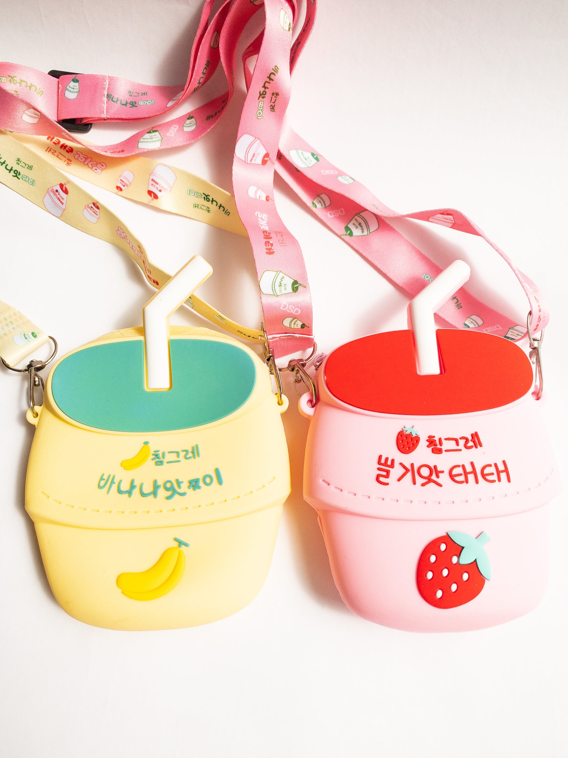 A bag shaped like your favorite childhood (and current!) beverage. This strawberry milk shaped bag is made of smooth silicone. It has one zip open with an adjustable fabric and removable strap. Sure to be a big hit!
