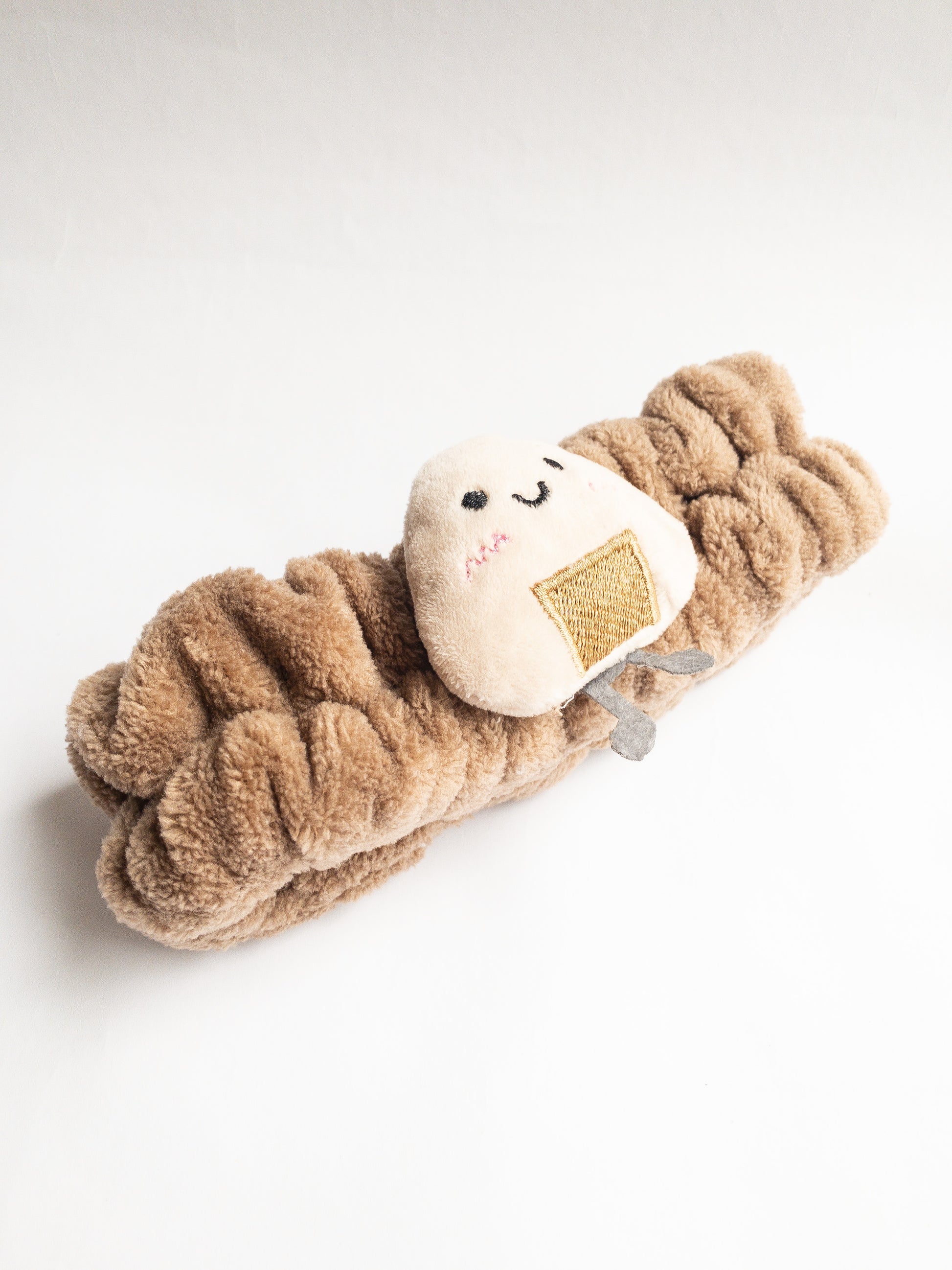 Our adorable onigiri plush spa headband makes the perfect accessory for all your spa days! Each headband is so soft and comfy with a cute rice ball (ju-mok bap in Korean). Pamper yourself in plushy-goodness and sweet, sweet relaxation! Go ahead, you deserve it!