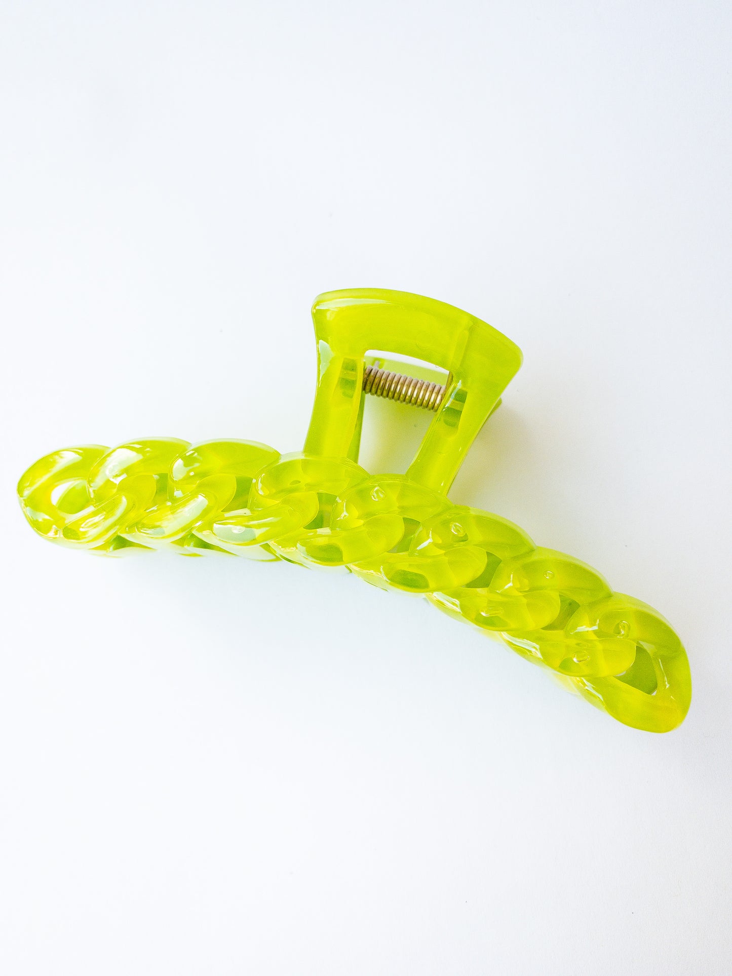 The brightest chain link hair claw clip in the most delectable candy hue! This green hair claw is large in size and strong enough to sweep up your hair in a messy updo. You're going to want one in every color!