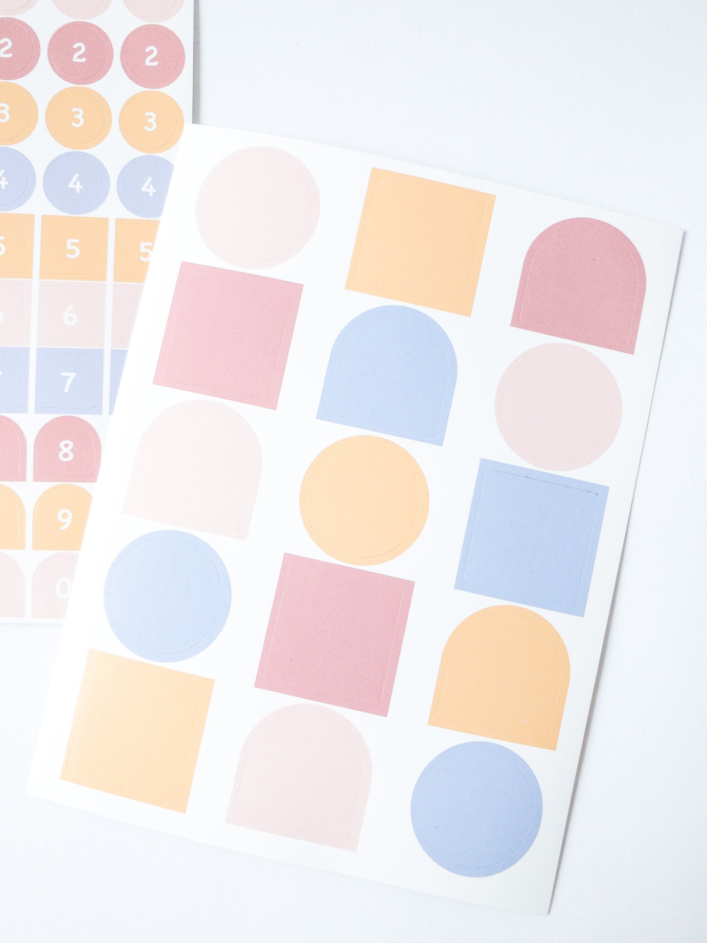 120 Korean style stickers! Three sheets of shapes and numbers in pretty pastel colors. There are 70 mini number stickers, 35 medium-sized shape stickers and 15 large shape stickers.