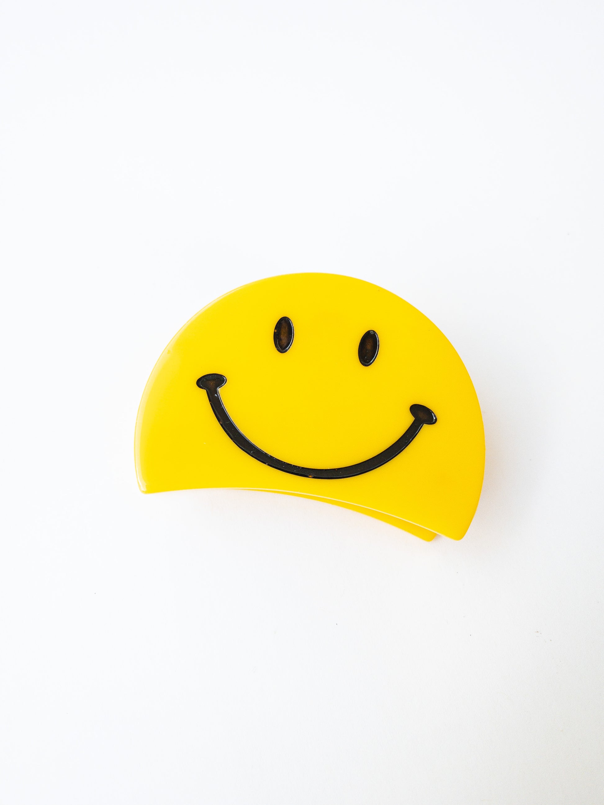 The happiest guy around! This half moon shaped smiley face hair claw clip is the perfect size for half up hairstyles. He's yellow and having the best day and has an infectious smile. 
