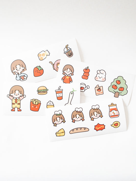 25 yummy fruity and foodie stickers! Each sticker set comes with 4 sheets of delicious apples, cheeseburger, ice cream cone, boba milk tea, a happy, hungry cartoon girl and more. Printed on clear sticker paper so you can see through the edges of each sticker. The cutest stickers to decorate or craft!