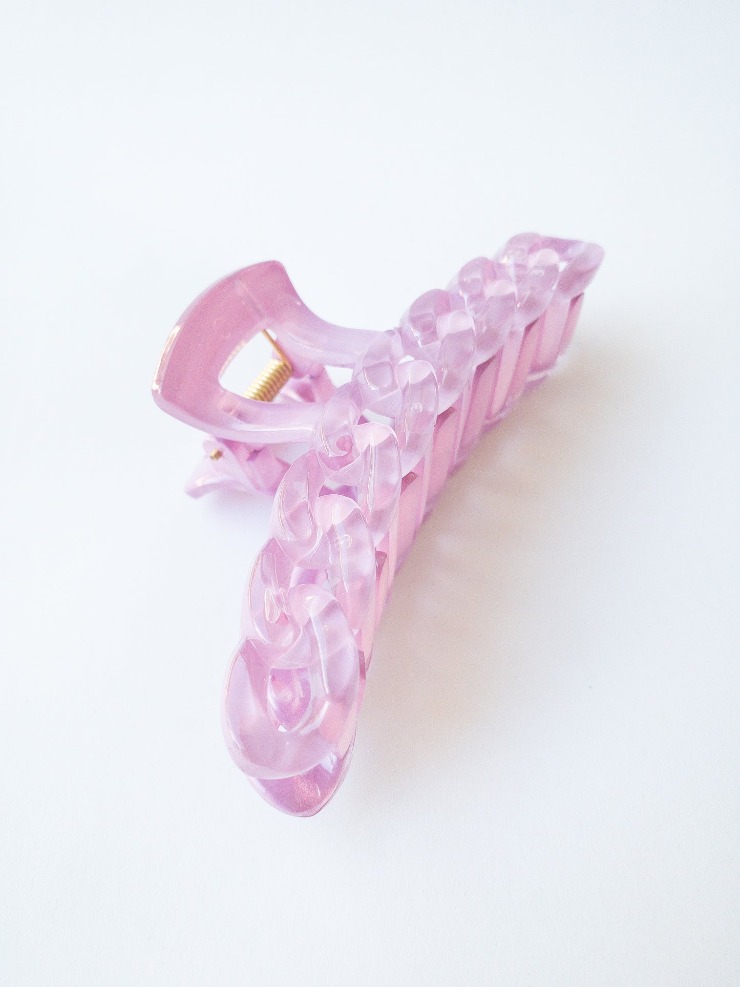 The brightest chain link hair claw clip in the most delectable candy hue! This purple hair claw is large in size and strong enough to sweep up your hair in a messy updo. You're going to want one in every color!