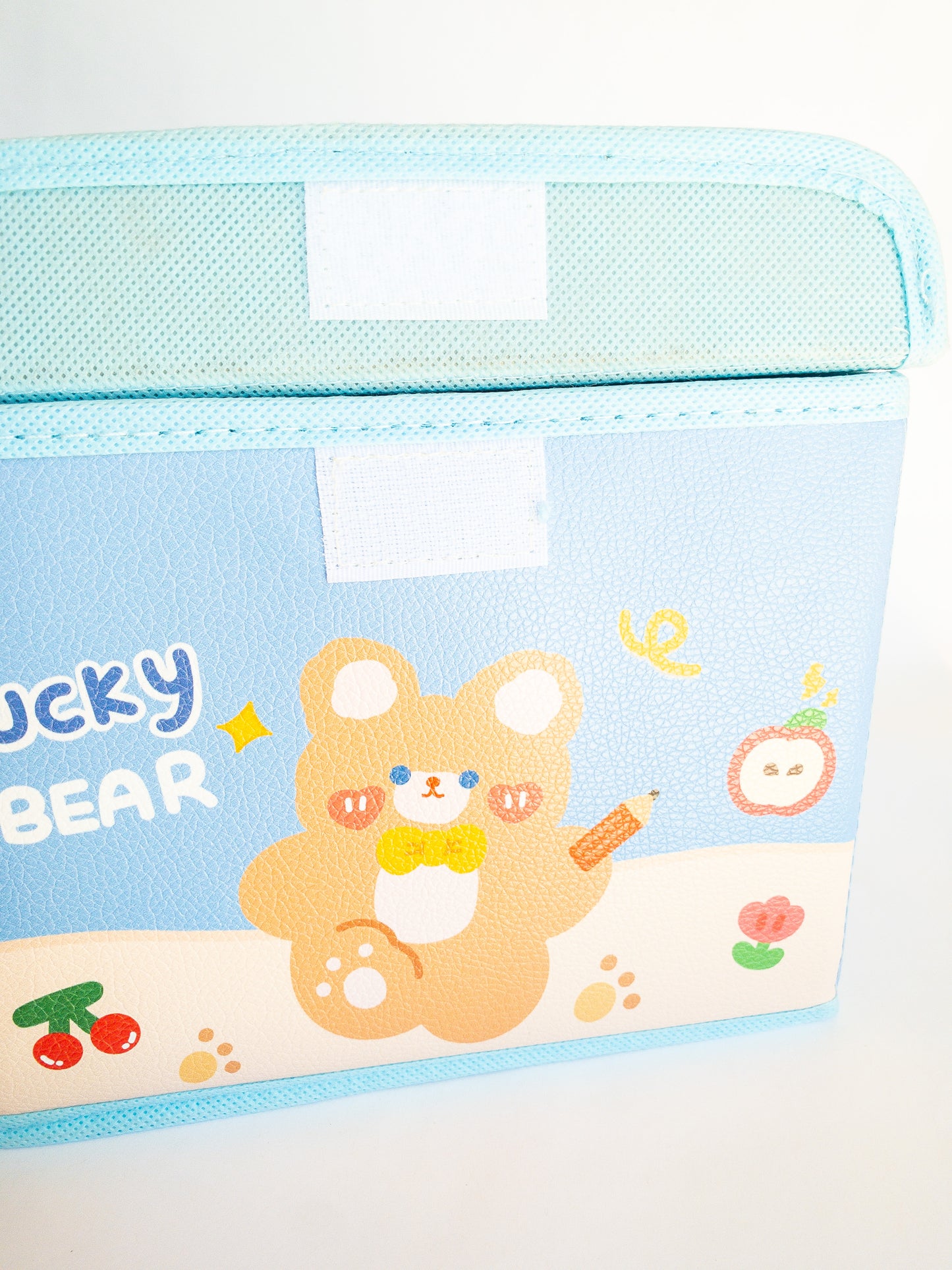 A multi-use, versatile storage box and the perfect place to throw all your Eggy Cakes hair clips in. The lid folds over and has a velcro close and it's large enough to hold pencils, markers, stickers, makeup, you name it. 