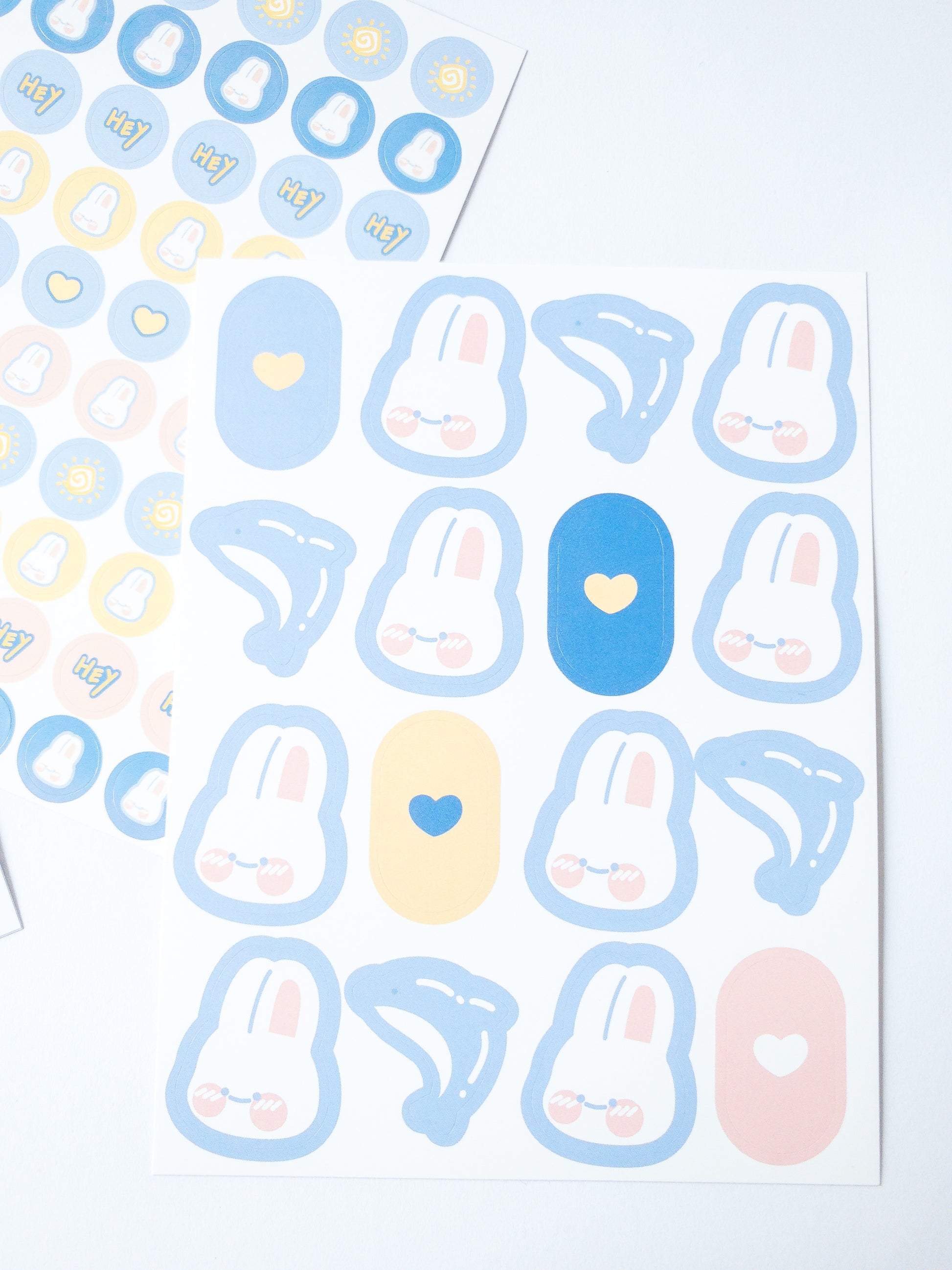 122 Korean style stickers! Three sheets of smiley bunnies and dolphins and more. There are 70 mini stickers, 36 medium-sized stickers and 16 large happy, smiley bunnies, dolphins and hearts.
