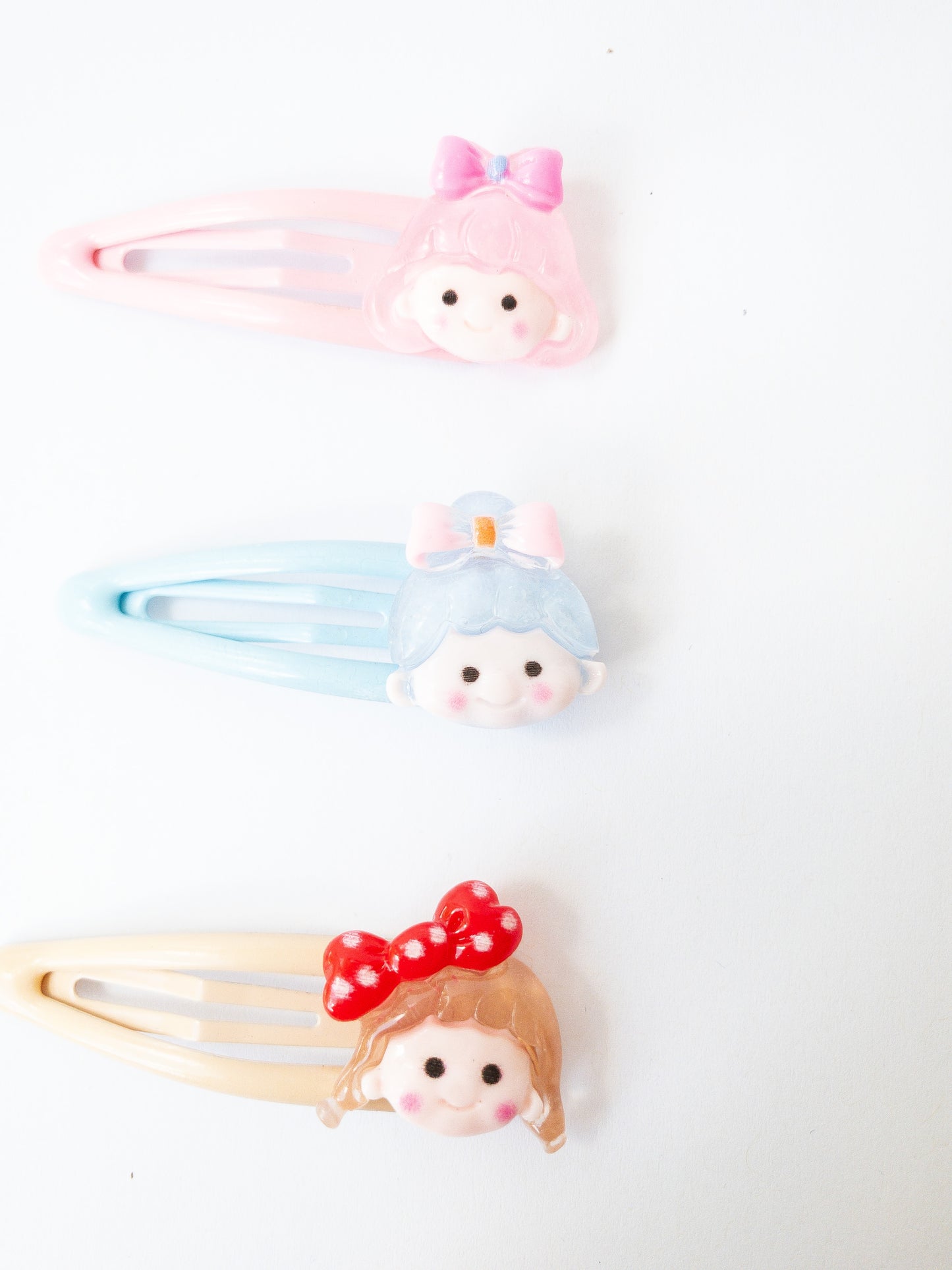 A sweet and mighty set of cartoon girl characters on glossy, pastel snap clips! Each set has 8 girl charms with a cute b