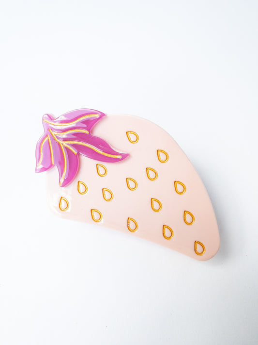 Beautiful pink strawberry with purple and gold accents. Nothing brightens up your day like a fun strawberry! This hair claw clip is a medium size, great for half up hairstyles. 