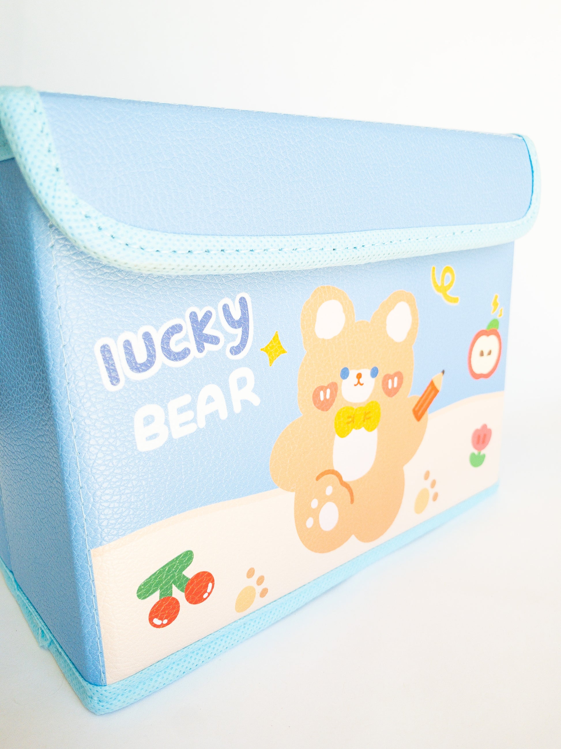 A multi-use, versatile storage box and the perfect place to throw all your Eggy Cakes hair clips in. The lid folds over and has a velcro close and it's large enough to hold pencils, markers, stickers, makeup, you name it. 
