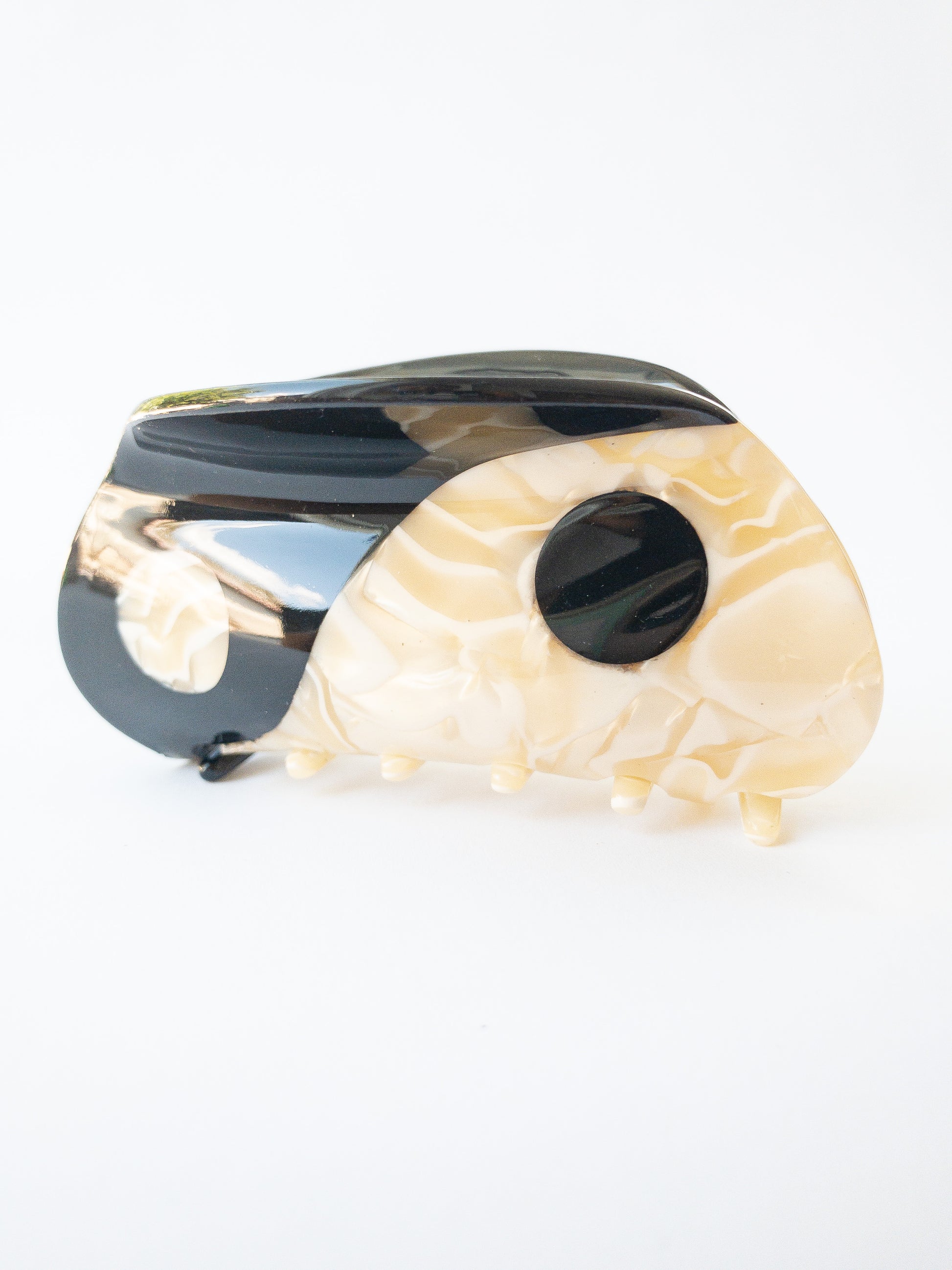 Large yin yang hair claw clip in a beautiful swirl of cream white and midnight black colors. This claw is shiny and strong, a great everyday staple.