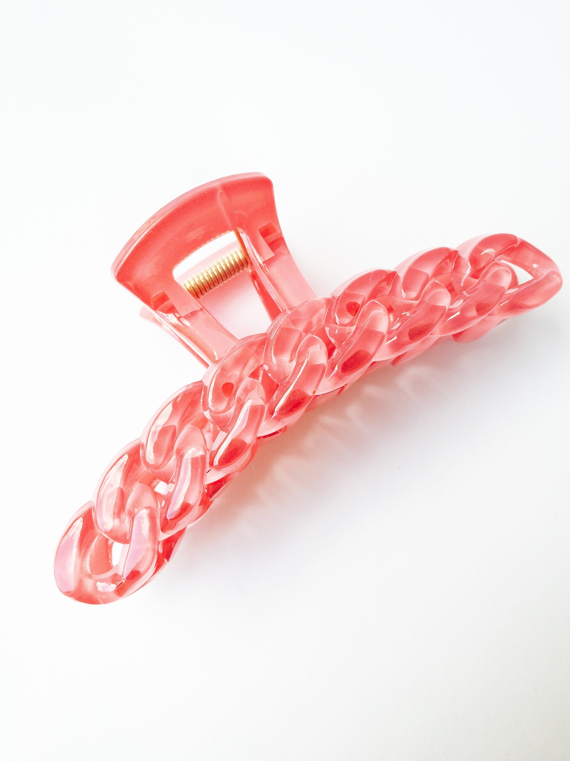 The brightest chain link hair claw clip in the most delectable candy hue! This pink hair claw is large in size and strong enough to sweep up your hair in a messy updo. You're going to want one in every color!