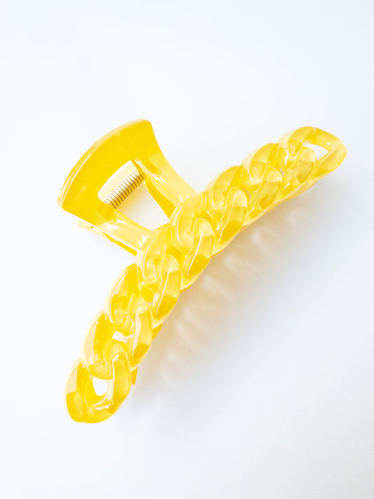 The brightest chain link hair claw clip in the most delectable candy hue! This yellow hair claw is large in size and strong enough to sweep up your hair in a messy updo. You're going to want one in every color!